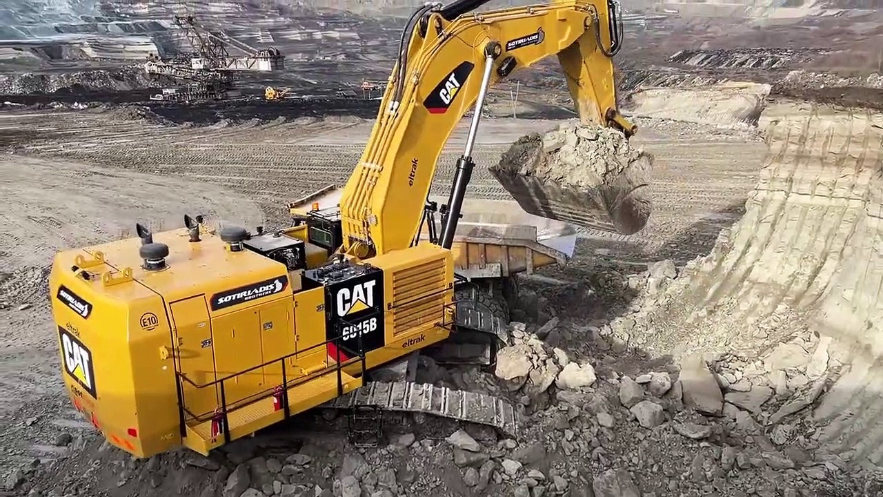 Caterpillar 6015B Excavator Loading Caterpillar Dumpers - Sotiriadis Mining Works
