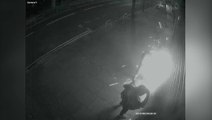 Watch masked burglars saw through metal shutters in raid at London tech shop