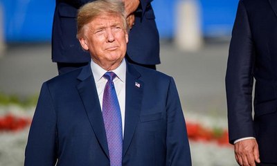 "صورة ترامب تدخل التاريخ" كواليس 20 دقيقة قضاها في السجن