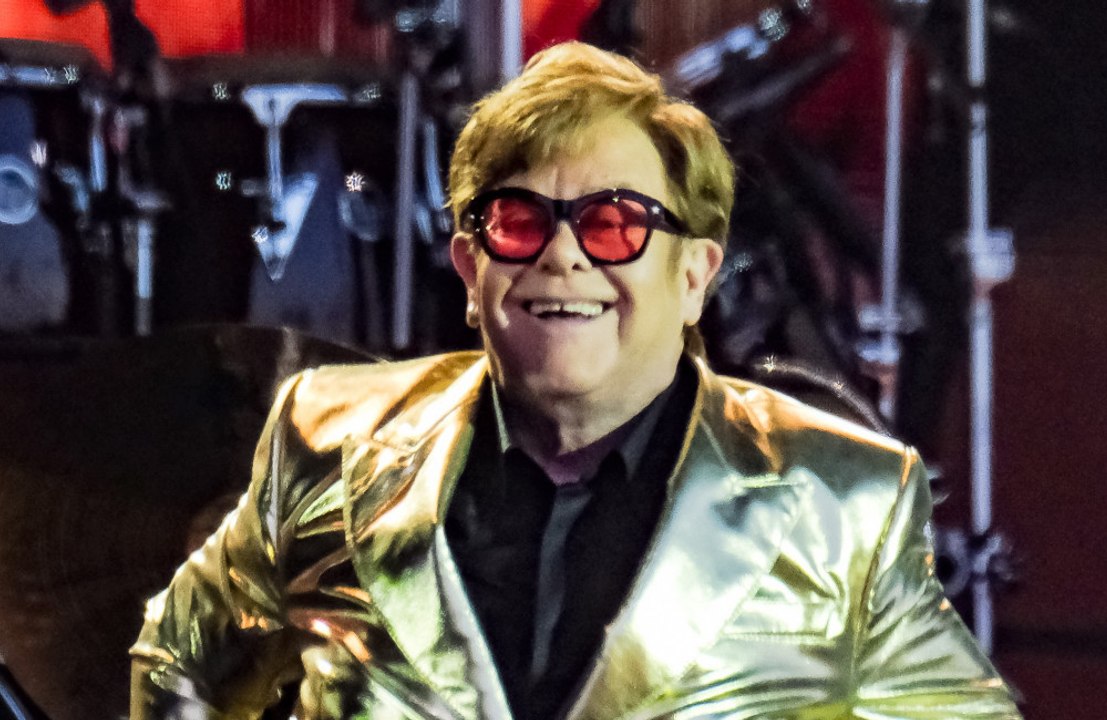 Sir Elton John is 'back home and in good health' after being rushed to hospital