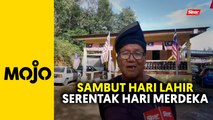 Peniaga bangga hias rumah dengan jalur gemilang