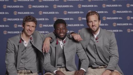 Harry Kane tries on Lederhosen for Bayern Munich shoot