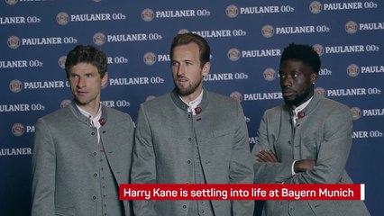 Harry Kane tries on Lederhosen for Bayern Munich shoot