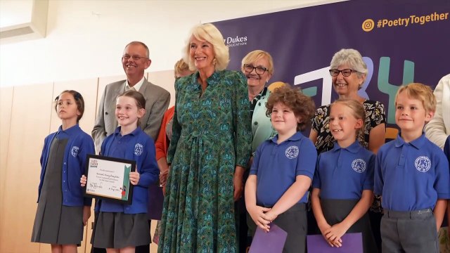 Queen joins schoolkids and grandparents for poetry recital
