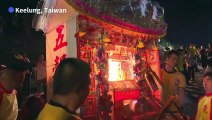Taiwan residents release water lanterns for Hungry Ghost Month