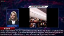 Injured passengers are stretchered off Delta flight while others are