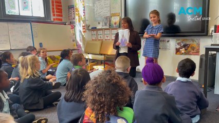 Six year-old Gillian Stewart teaches her peers Auslan