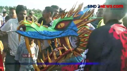 Serunya Festival Layang-layang di Pesisir Desa Silo Baru, Ada Doraemon dan Naga Raksasa