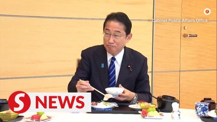 Japan's PM savours Fukushima seafood, vows to overturn China's ban on seafood import