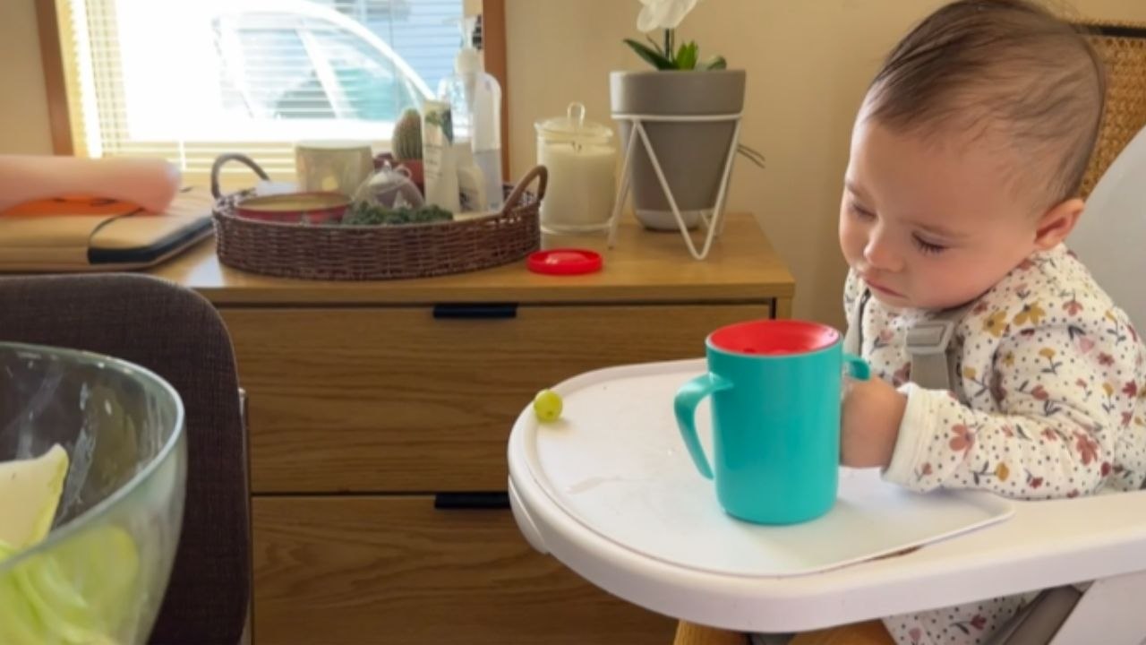 Baby girl learns the meaning of 'REAL STRUGGLE' as she tries to stop herself from falling asleep