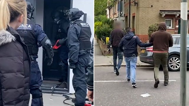 Police break down door of British-based fraudsters who preyed on elderly to steal millions