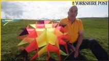 Alan Poxon, Kite Maker flying his kites on Malham Moor