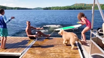 Surfing Mishap: Hilarious Pier Plunge!