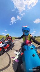 Motorcyclists Share Gummy Worms
