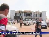 Libye: combats nourris à Tripoli, la tête de Kadhafi mise à prix