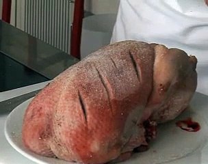 Canard confit aux échalotes et à l'ail