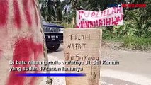 Infrastruktur Rusak Belasan Tahun, Warga di Asahan Bangun Kuburan di Tengah Jalan