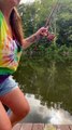 Woman Catches Catfish After It Takes Off With Her Fishing Pole