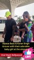 Bipasa Basu & Karan Singh Grover with their adorable baby girl at the airport