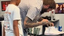 Post Malone takes his shoes off and gives them to young fan at meet-and-greet
