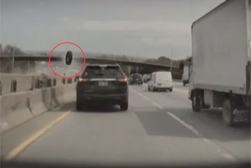 Watch the moment a tyre flies off one vehicle and crushes another car