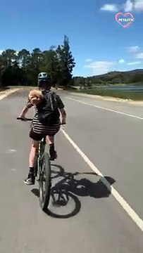 Family Enjoying Bike Ride Picnic With Their Dogs PETASTIC