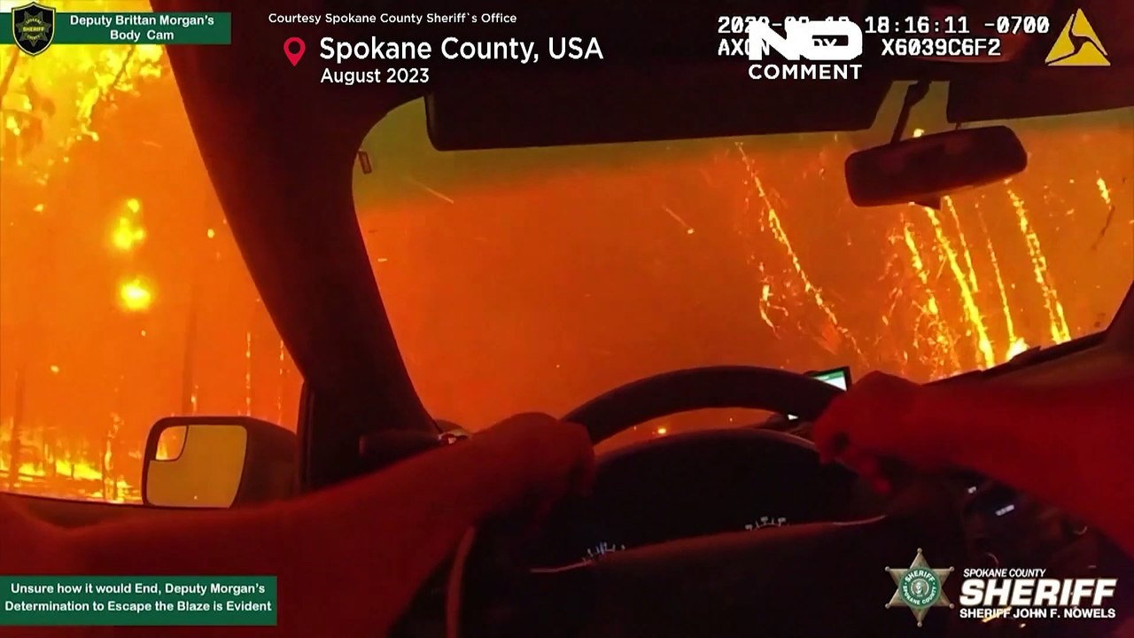 Spektakuläre Aufnahmen: Polizist flieht vor lodernden Flammen im Spokane County