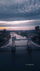 See Tower Bridge Enjoy the evening breeze along the River Thames, London.