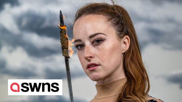 Globe-trotting archer sets the stage ablaze, shooting flaming arrows with her feet