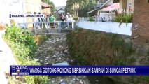 Warga Gotong Royong Bersihkan Tumpukan Sampah di Sungai Petruk, Malang