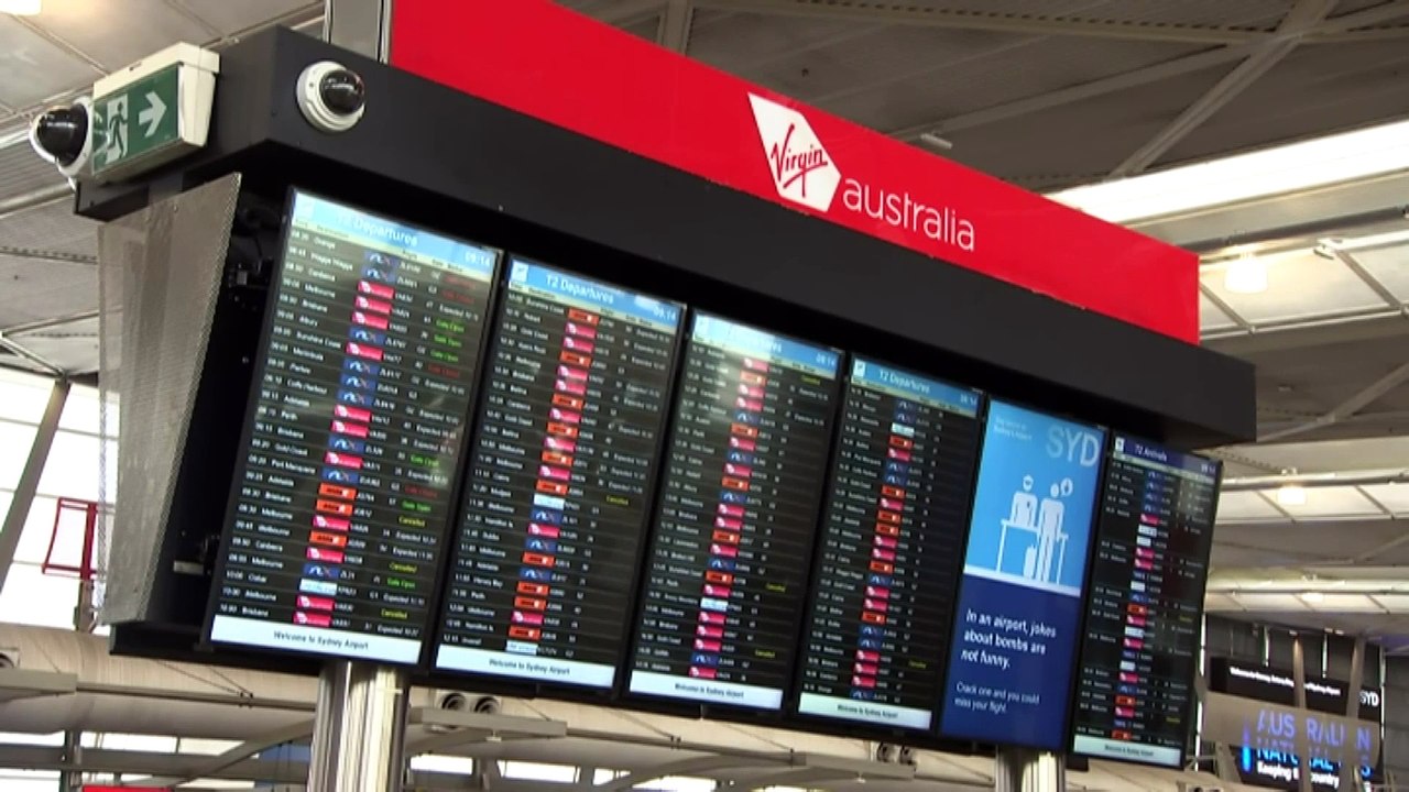 Strong winds and torrential rain cause disruptions at Sydney airport