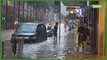 Les habitants de Hong Kong réagissent aux pires pluies depuis près de 140 ans