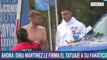 ¡DIBU MARTÍNEZ LE FIRMA EL TATUAJE A SU FANÁTICO!