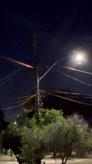 Meteor Streaks Across Night Sky