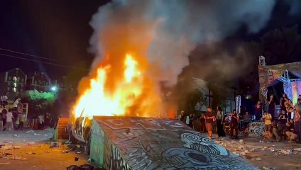 Breaking: a lot of skateboarders have set fire to a police vehicle. Police calling unlawful assembly.