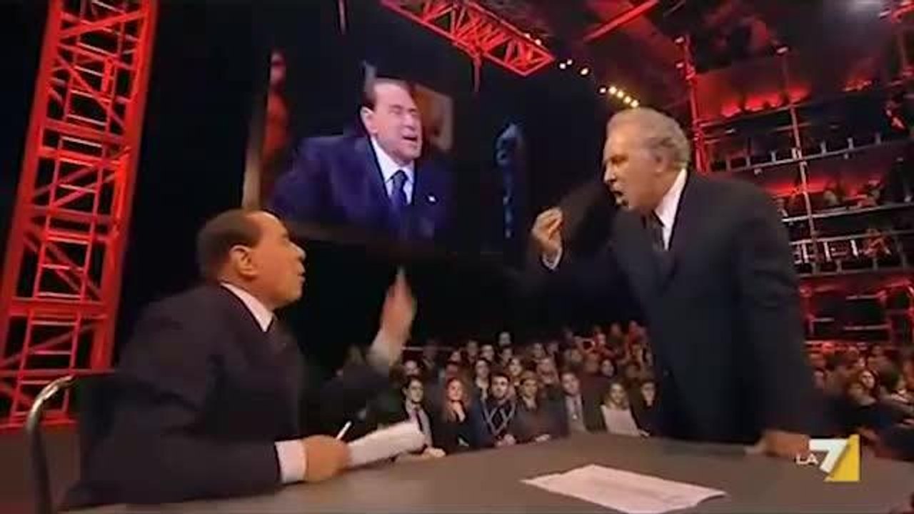 Berlusconi, rissa con Santoro. E poi pulisce la sedia di Travaglio