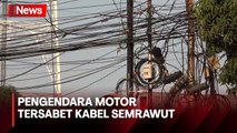 Pengendara Motor dan Anaknya Jatuh Tersabet Kabel Semrawut di Jakarta Barat