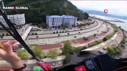 Vatandaşlar şaşkınlıklarını gizleyemedi! Giresun’da yamaç paraşütçüsünün fındık harmanına zorunlu iniş yaptığı anlar kamerada