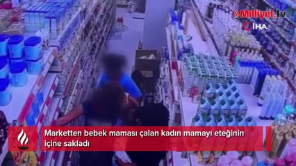 Çaldığı mamayı eteğinin içine sakladı
