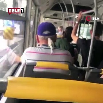 Görenler gözlerine inanamadı! Halk otobüsünde ensesindeki muhabbet kuşuyla seyahat etti