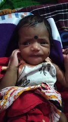 Hungry baby feeling sleepy