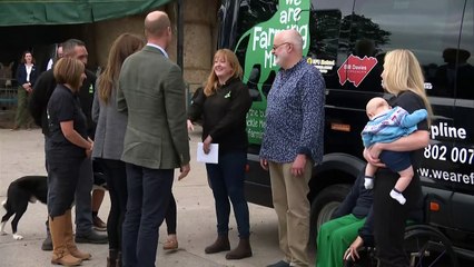 Prince Farming: William and Kate stroke adorable donkey