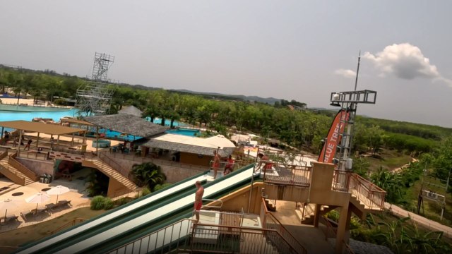 Man amazingly does a full body flip on a waterpark slide *Gymnastic Flips*