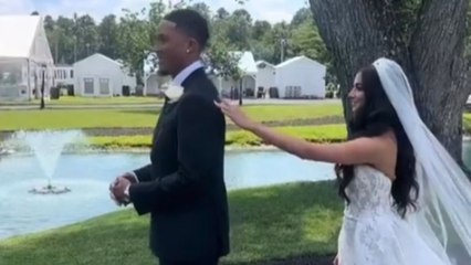 Groom's heart becomes a pool of affection after seeing bride in her wedding dress