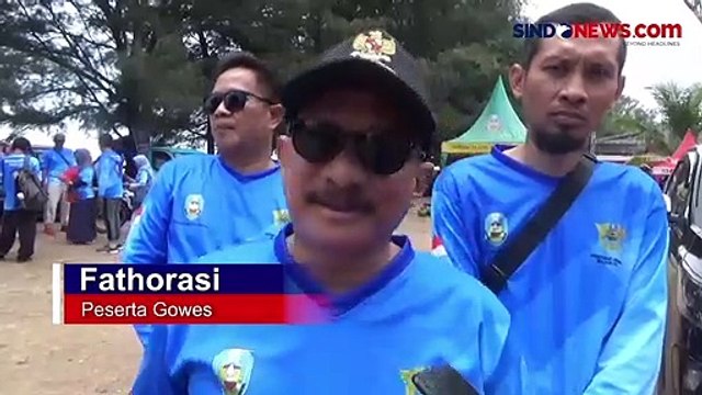 Tolak Rokok Ilegal dengan Gowes Seru di Pantai Pasir Putih