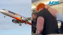 Dramatic footage goes viral after a man is dragged off Jetstar domestic flight by police