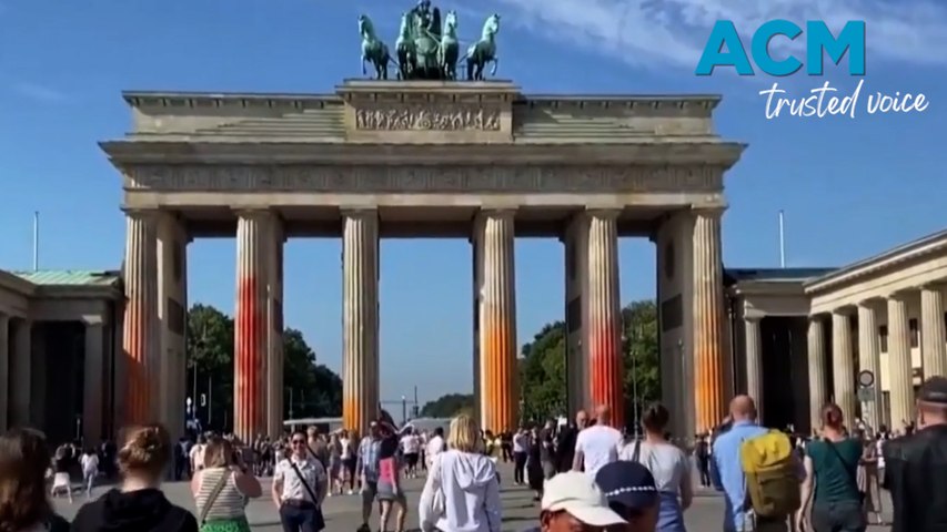German climate activists sprayed orange paint onto Berlin’s Brandenburg Gate to urge the German government to take more urgent action against climate change.