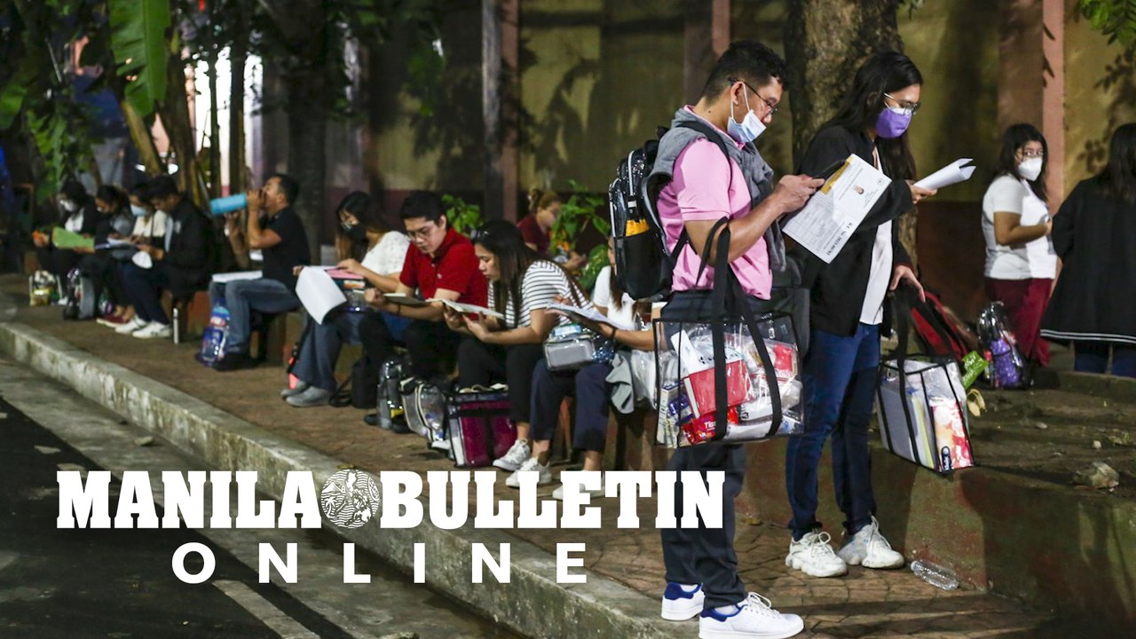 Bar takers line-up early for the first day of the 2023 Philippine Bar Examinations