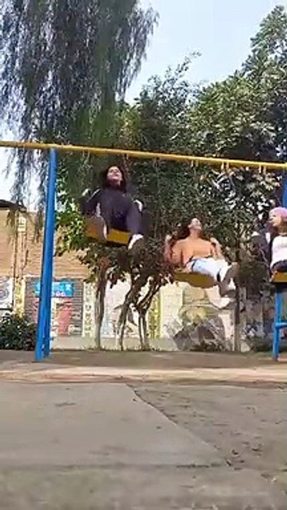 Friends Fall Off Swings Together