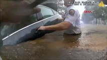 Polisin su baskınında aracıyla mahsur kalan sürücüyü kurtarma anları kamerada